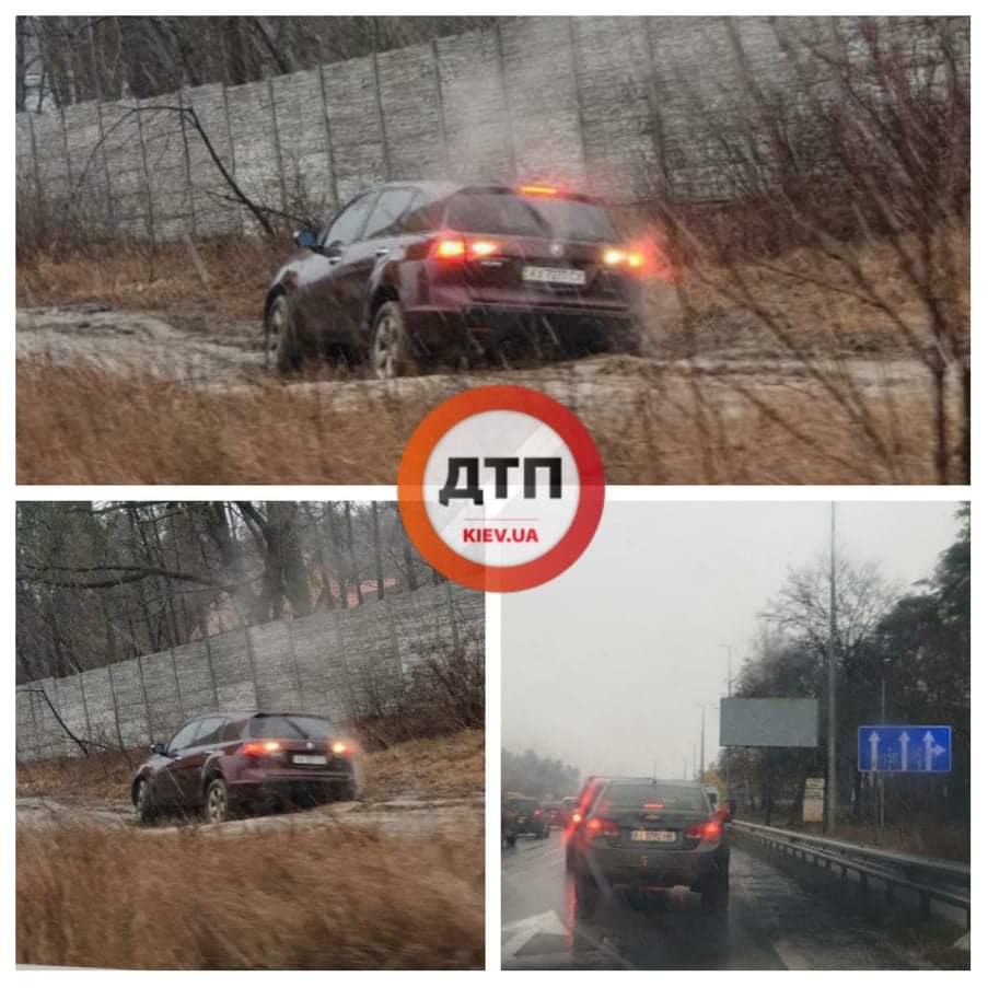 Под Киевом внедорожник объезжая пробку по грунтовой дороге застрял в грязи: нужна помощь